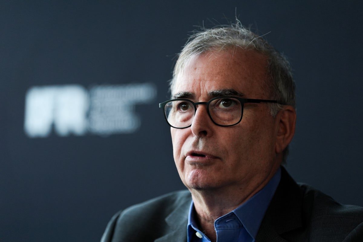 Regulator vows to quit if politics touch Man City case